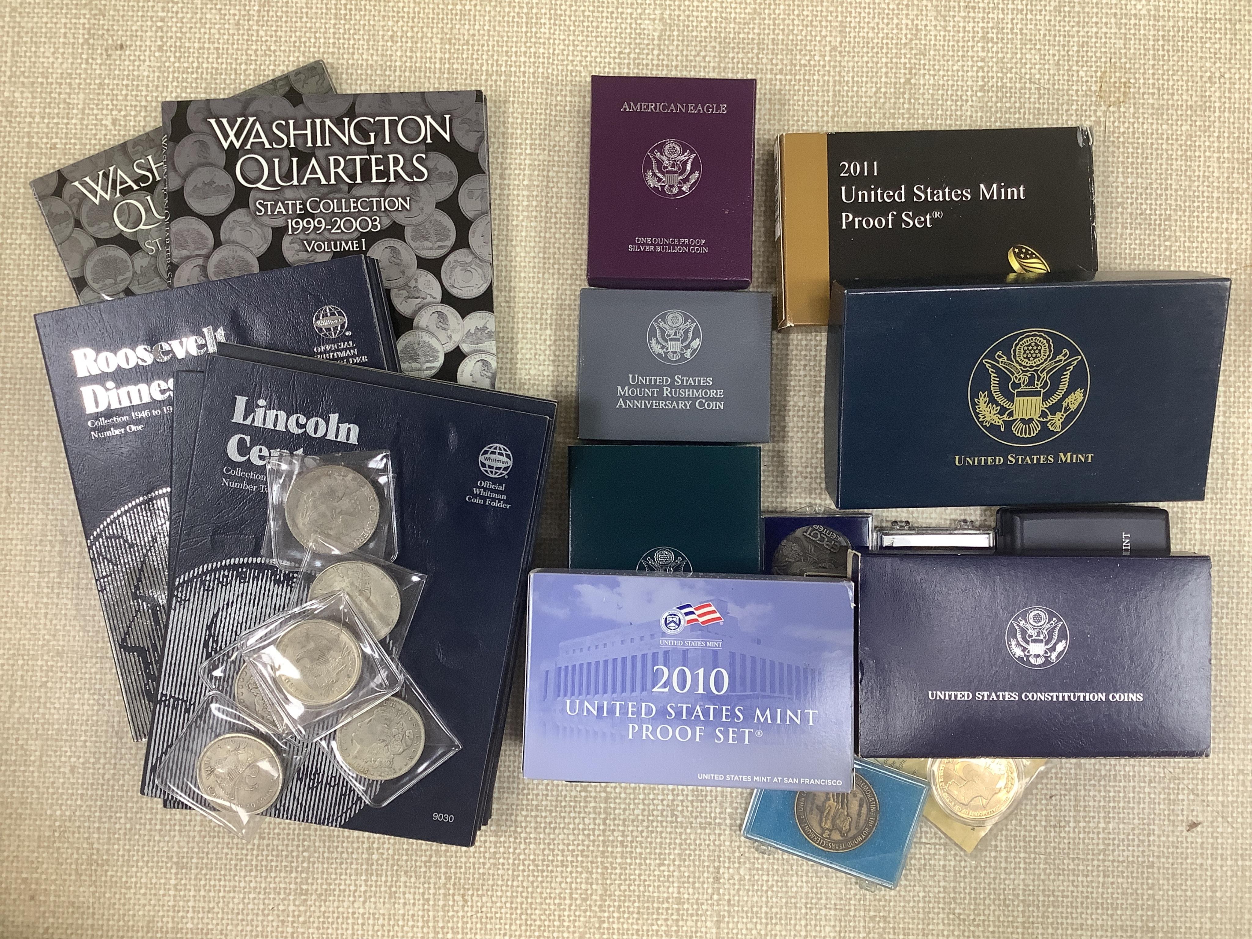 USA coins, proof and uncirculated coins and year sets, together with Washington quarters state collection volume, one volume two, incomplete Jefferson nickels, Roosevelt dimes, Lincoln cents, Washington quarters, Morgans